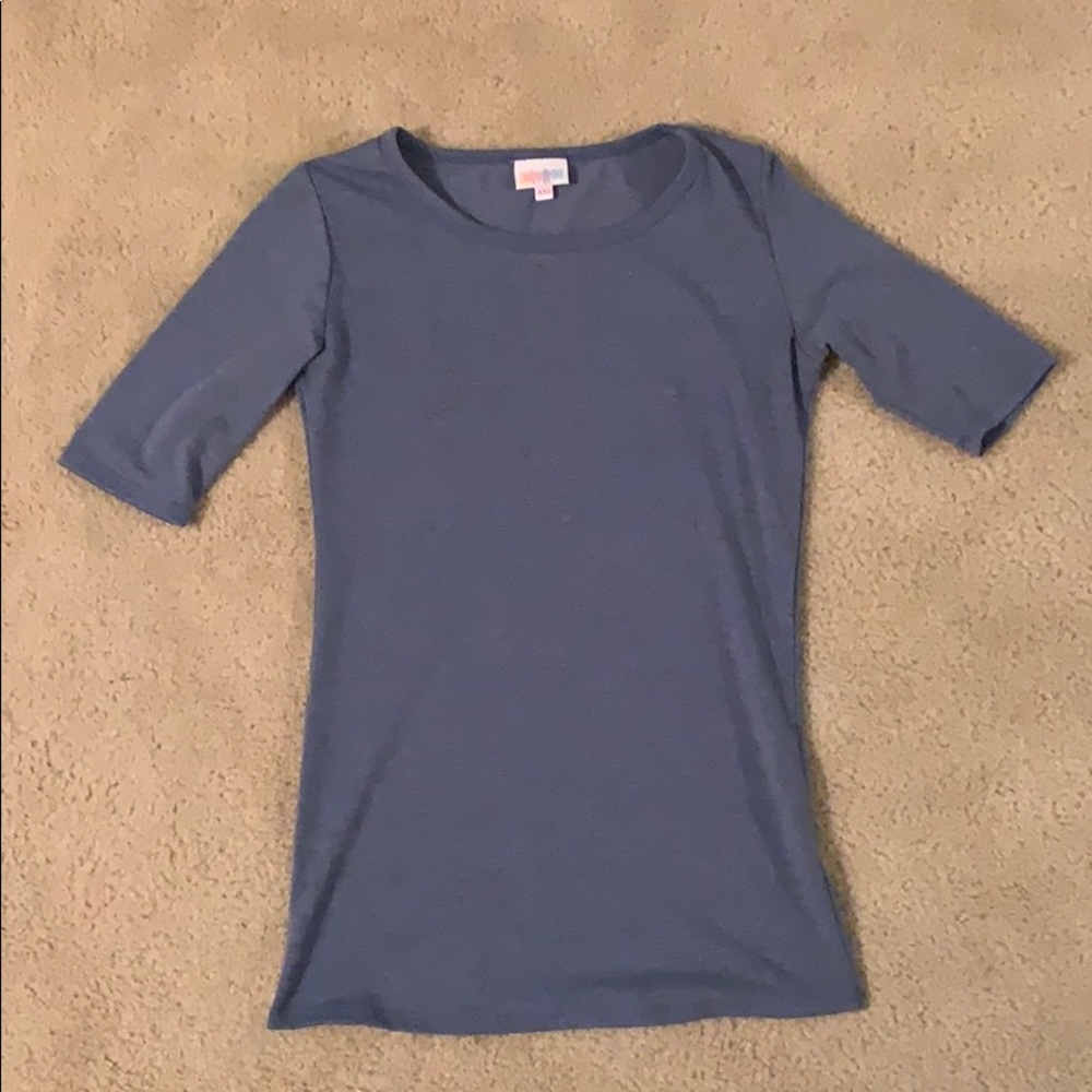 A blue short sleeve top